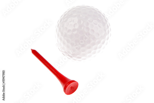 Golf ball and tee over white