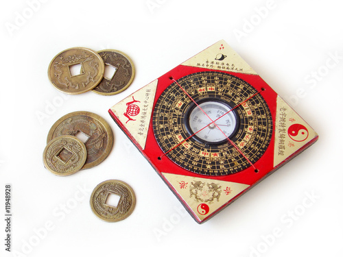 Feng shui compass and chinese coins.