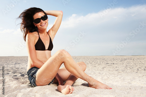 Woman relaxing at the beach.