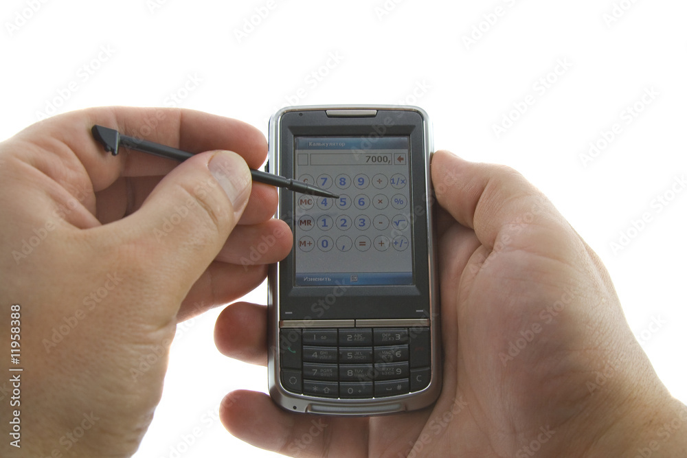 Handhedl computer in hands, isolated white Handhedl computer in hands, isolated white