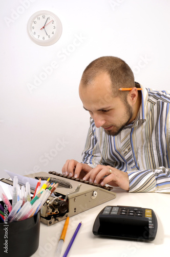 Fotografía Man typing on Old Typewriter