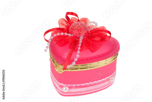 .Heart-shaped casket decorated by pearls isolated on white