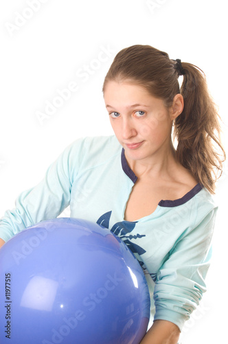 Young woman with fitness ball