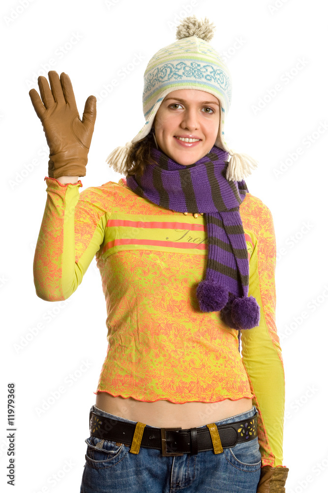 Beautiful young girl in winter hat and scarf. Isolated on white. Beautiful young girl in winter hat and scarf. Isolated on white.