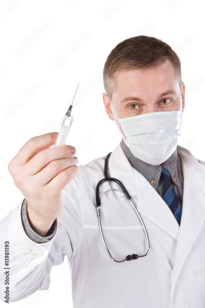 The doctor in a mask with a syringe The doctor in a mask with a syringe