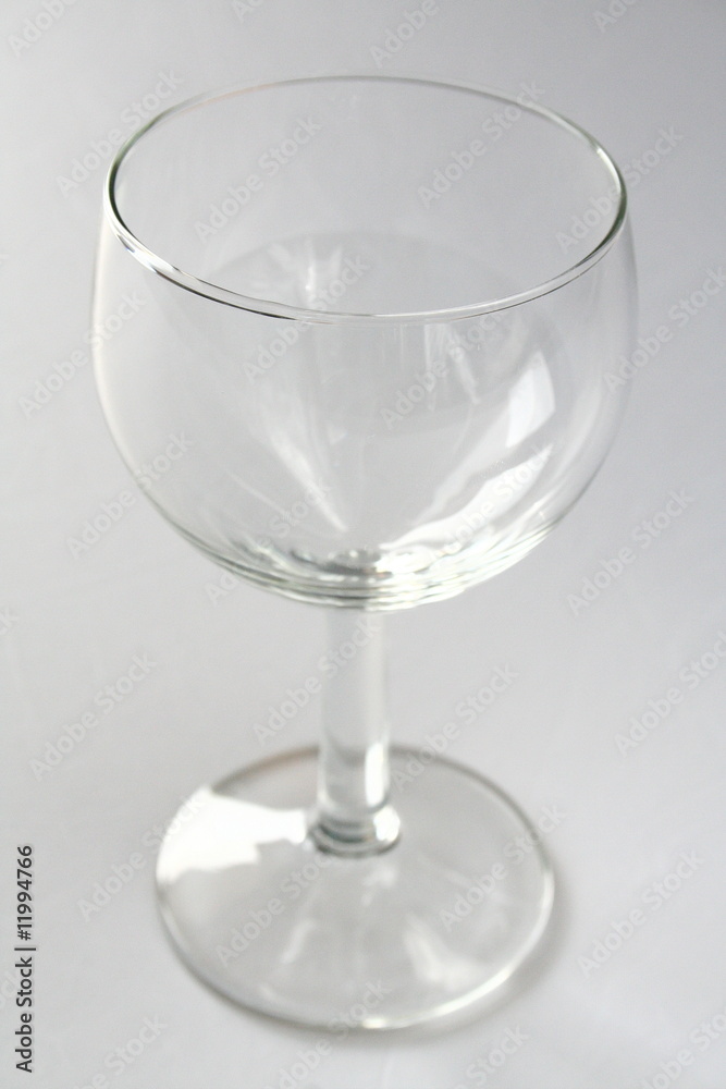 An empty wine glass, isolated on white background An empty wine glass, isolated on white background