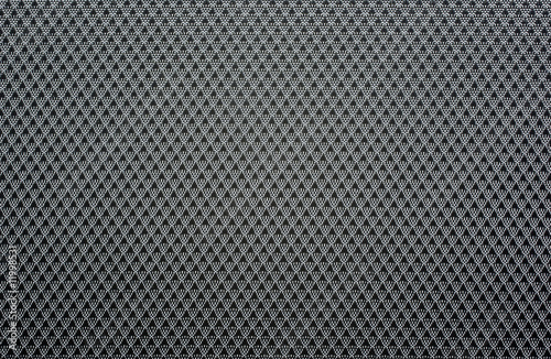 Abstract textile pattern black and silver background.