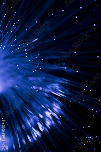 abstract blue fiber optic over black background