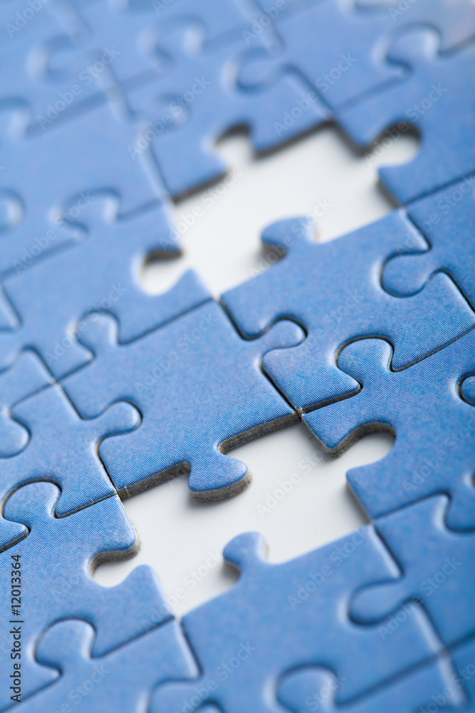 abstract puzzle background with two missing pieces abstract puzzle background with two missing pieces