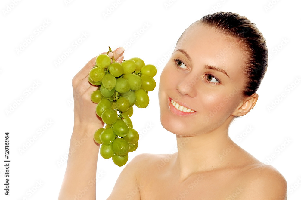 young women with beautiful face and green grapes young women with beautiful face and green grapes