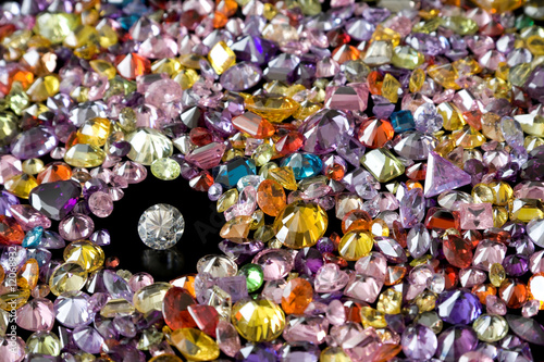 Solitaire Diamond Surrounded By Colorful Gems