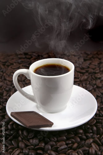 white porcelain coffee cup and chocolate