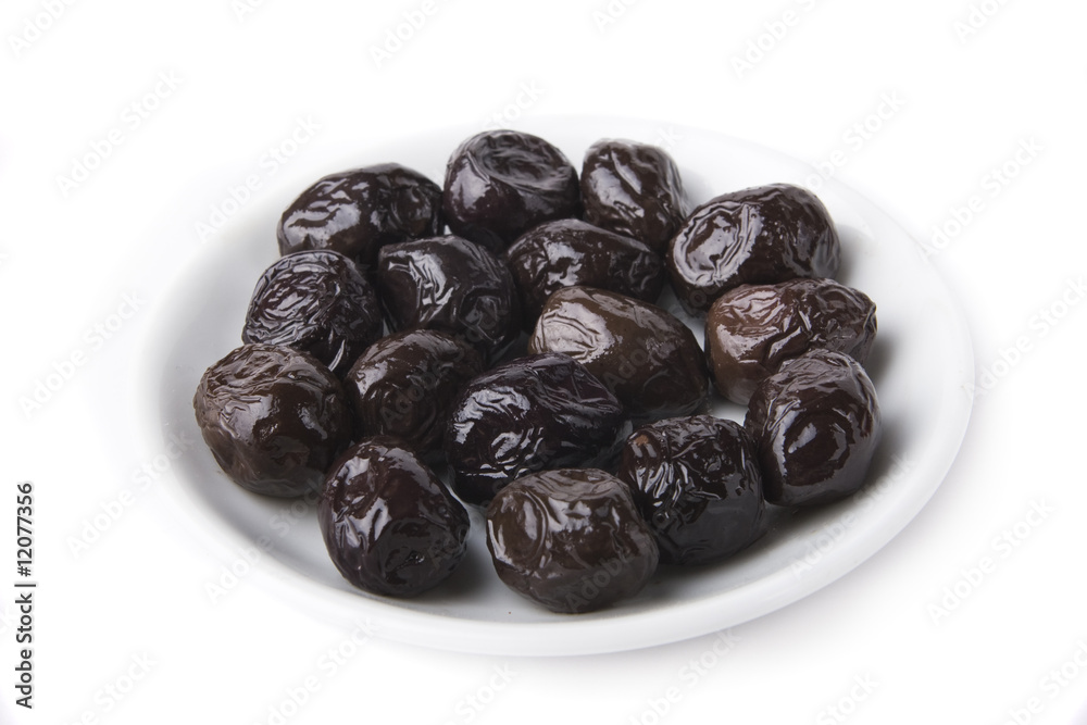 Black Olives in a Plate on White Black Olives in a Plate on White