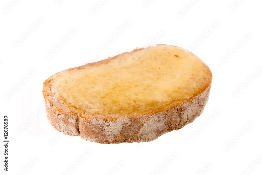 Slice of Bread with Honey Spread on White Slice of Bread with Honey Spread on White