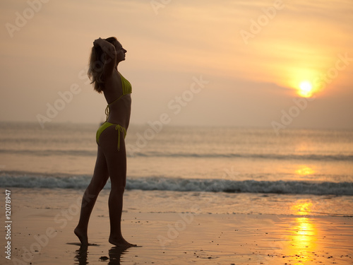 Woman at sunrise time