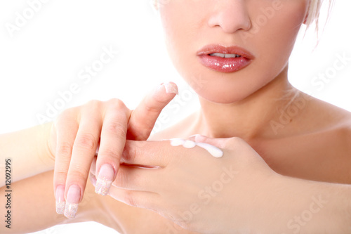 girl with moisturizer isolated in white