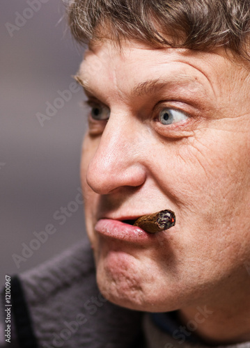 Furious man with cigar