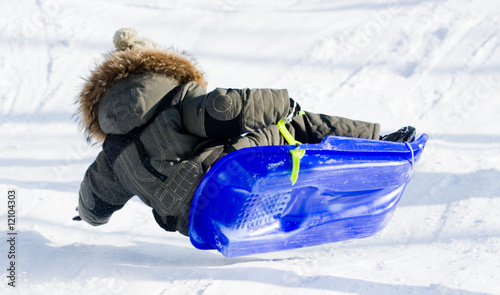 Canvas Print Child on a sled
