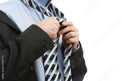 Fotografija Putting on necktie