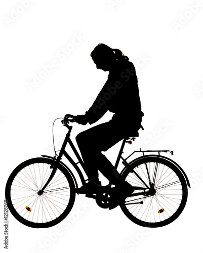 Fototapeta Naklejka Na Ścianę i Meble -  Silhouette of a man on a bike