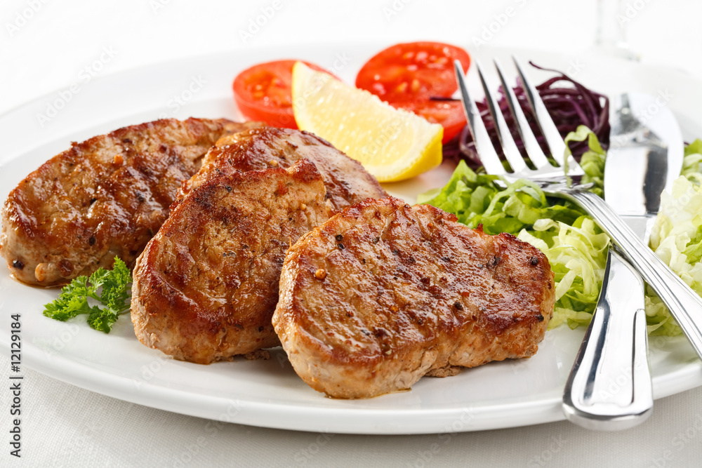 Grilled meat with vegetable salad
