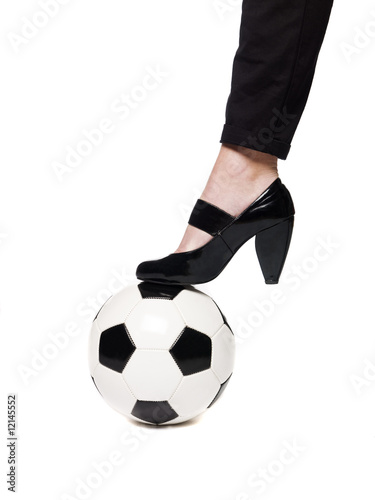 Fotball and a lady`s slipper