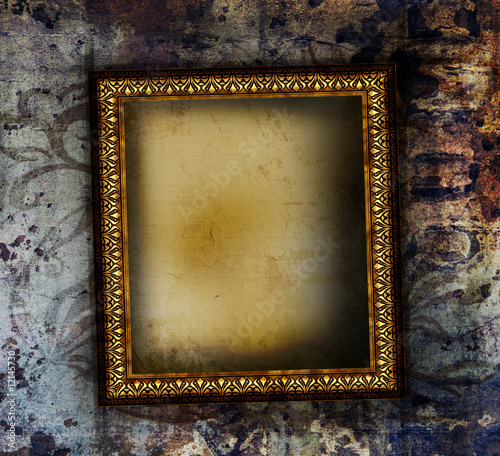 Gilded frame on grunge background