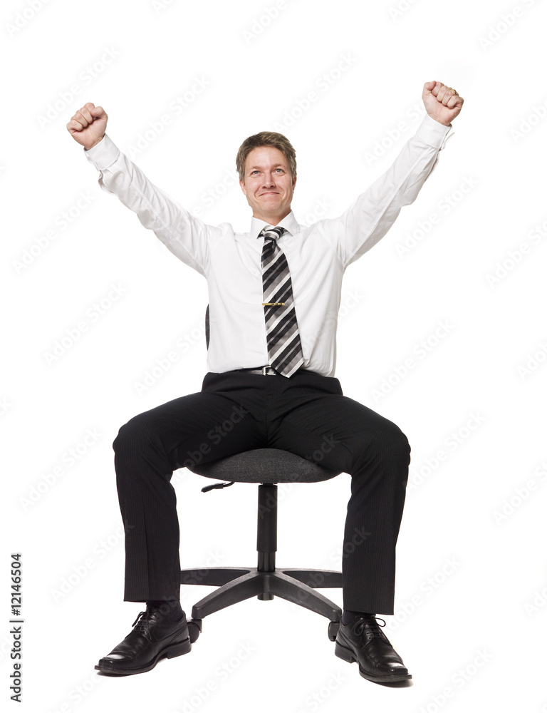 Happy man siting on a office chair Happy man siting on a office chair
