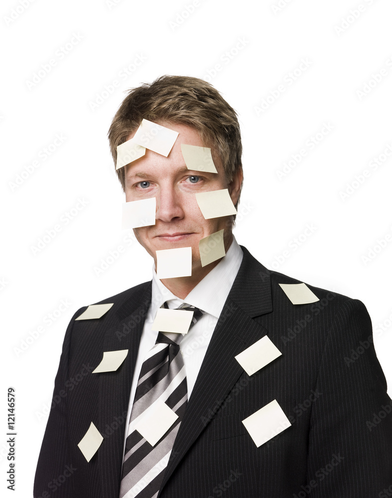 Man with postitnotes all over his face Man with postitnotes all over his face