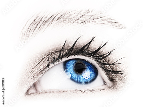 Blue eye of a woman.