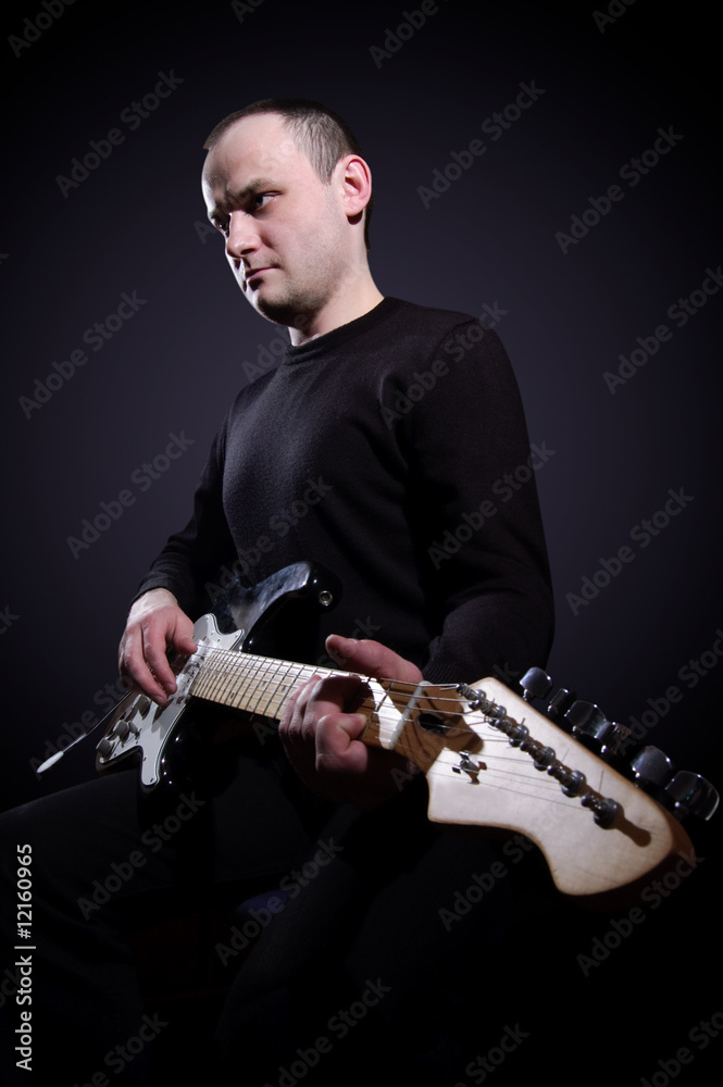 Obraz premium Musician playing guitar