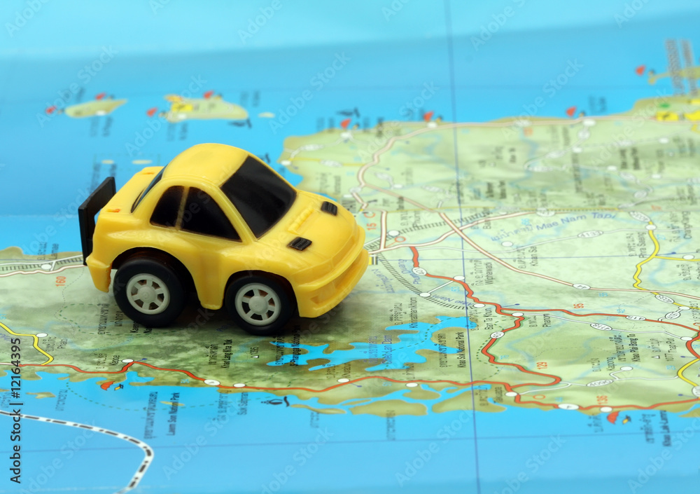 Small car on a map Small car on a map