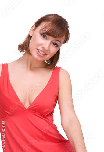 Portrait of the beautiful girl in red dress