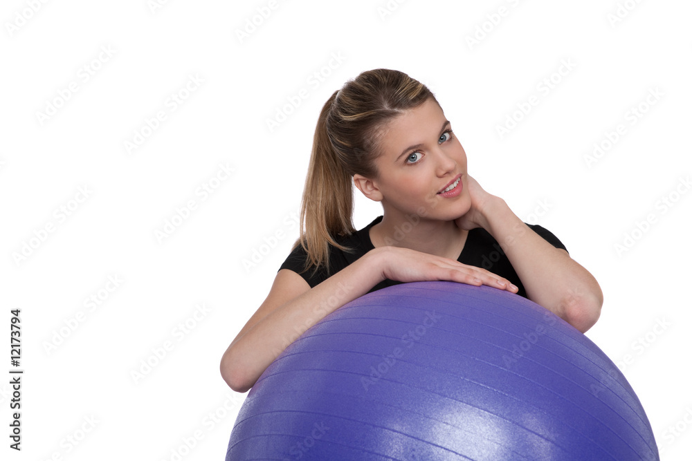 Beautiful woman with purple fitness ball Beautiful woman with purple fitness ball
