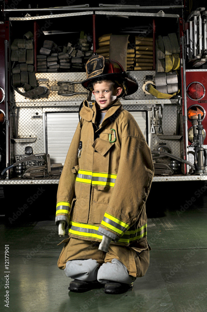 Fototapeta premium Portrait of a firemans son