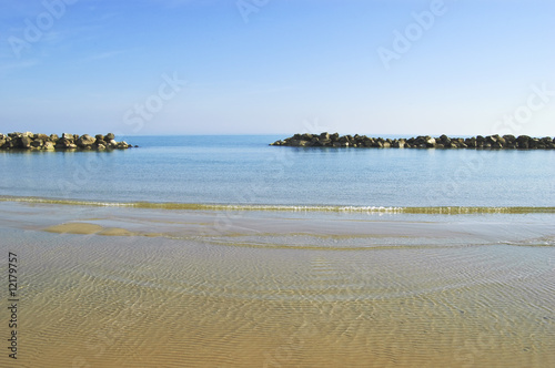 Beach with a stone wall