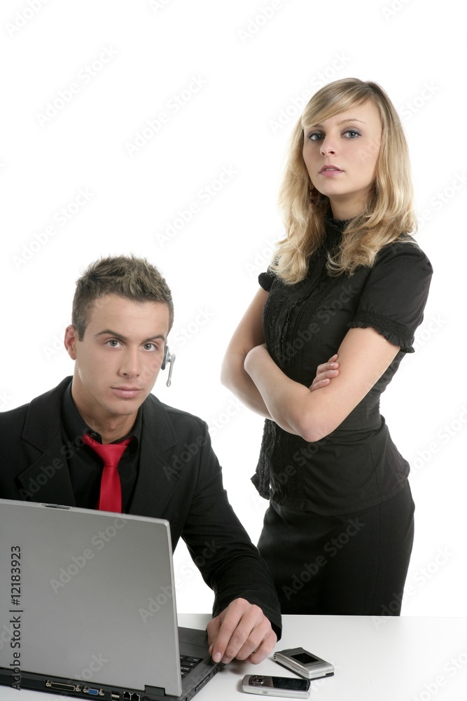 Young business couple laptop isolated on white Young business couple laptop isolated on white