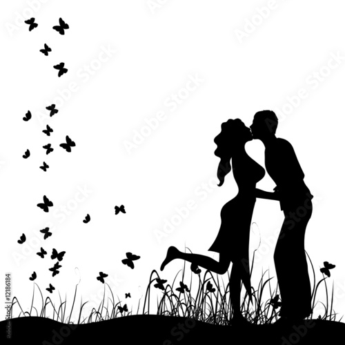 Couple kisses on a meadow, black silhouette