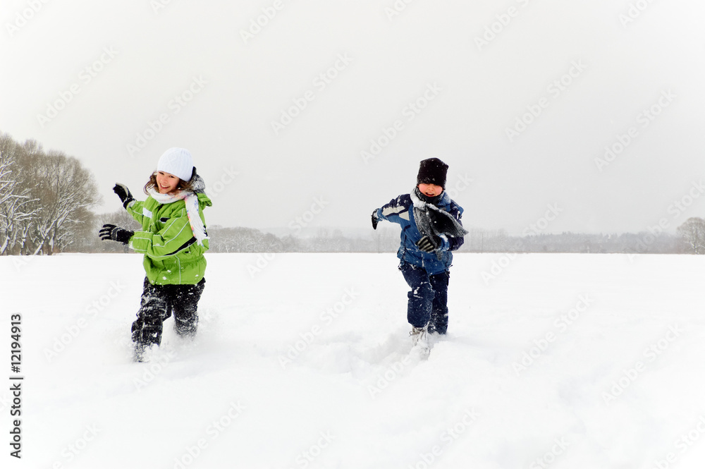 Kids running in snow