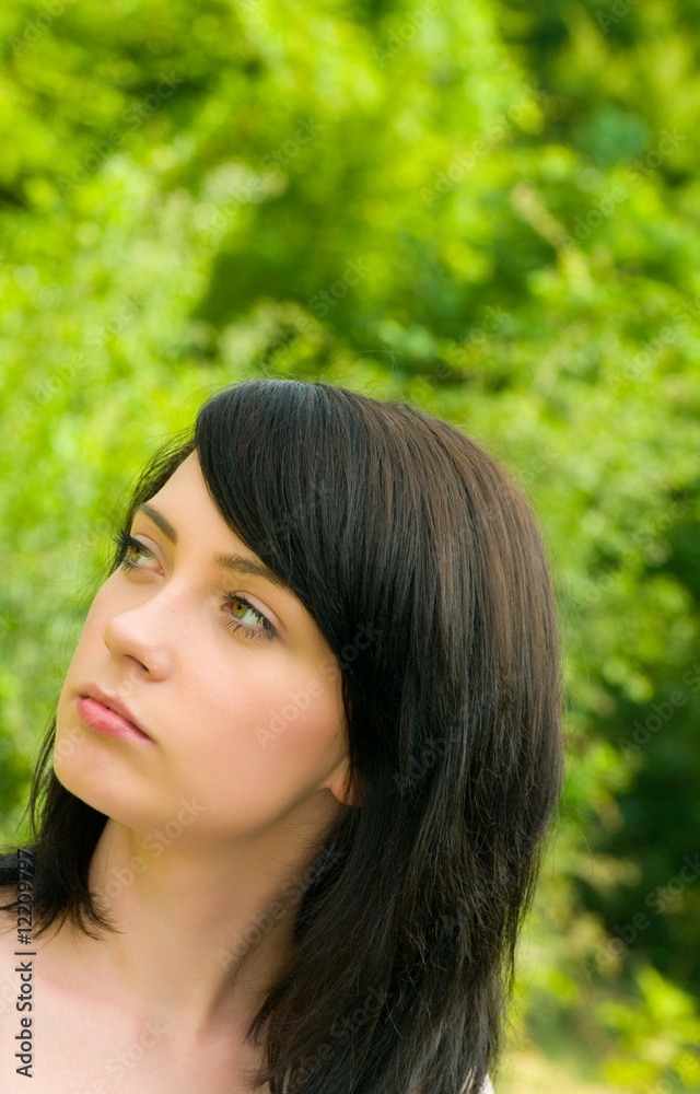 Young woman in the forest in summer Young woman in the forest in summer