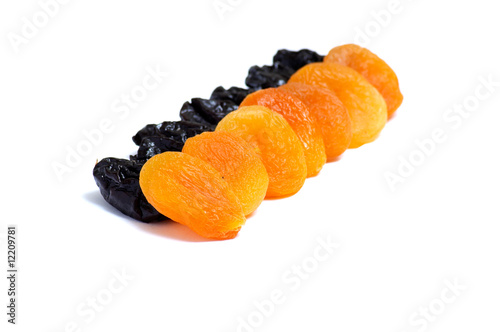 Wonderful dried apricot and prune   on a white background. photo