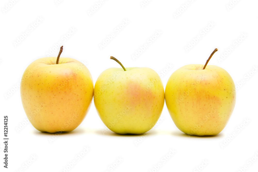 lots of yellow apples isolated on white lots of yellow apples isolated on white