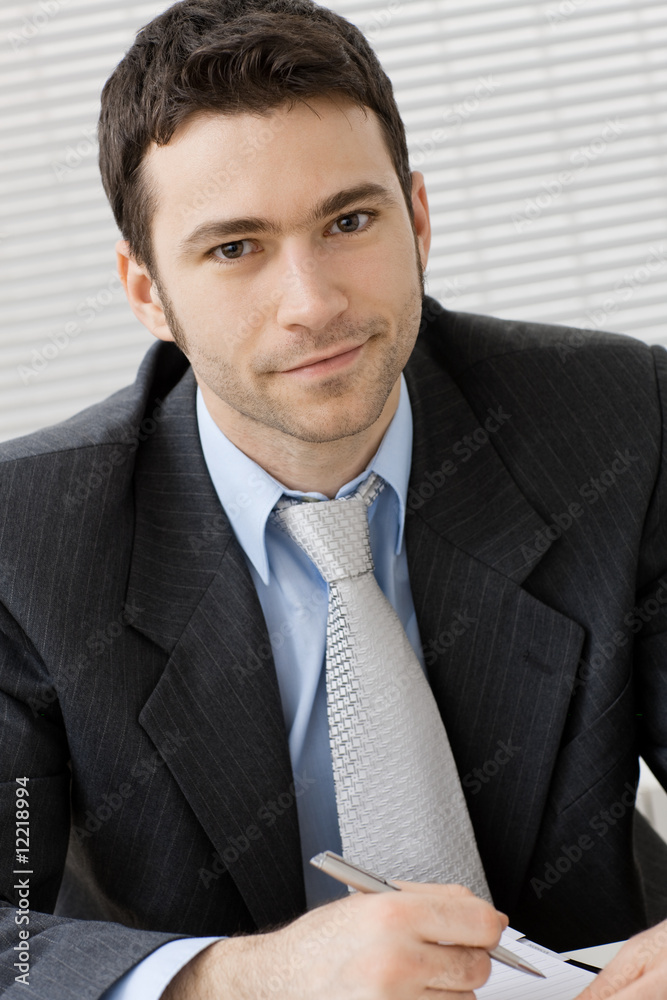 Portrait of smiling businessman Portrait of smiling businessman