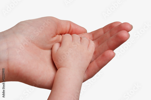Mother holding her child's hand isolated on white background