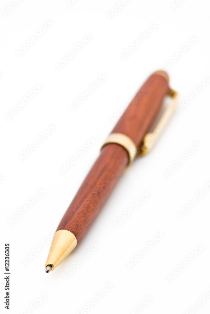 A wooden ballpoint pen isolated on white A wooden ballpoint pen isolated on white