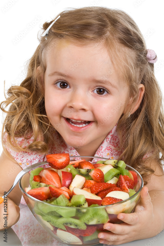 Happy little girl with a bowl of fruit salad Happy little girl with a bowl of fruit salad