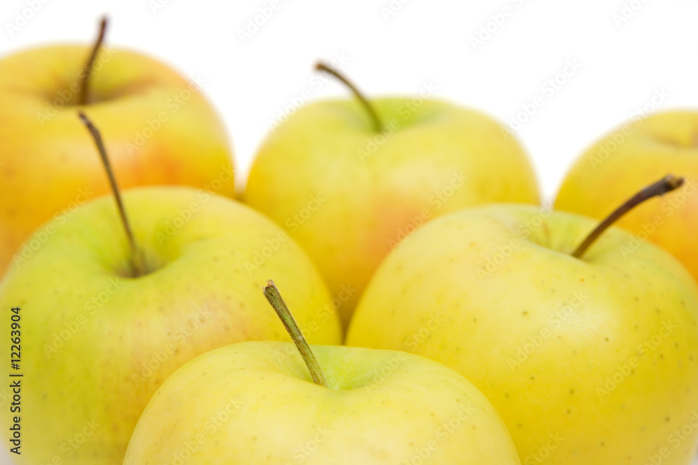 lots of yellow apples isolated on white lots of yellow apples isolated on white