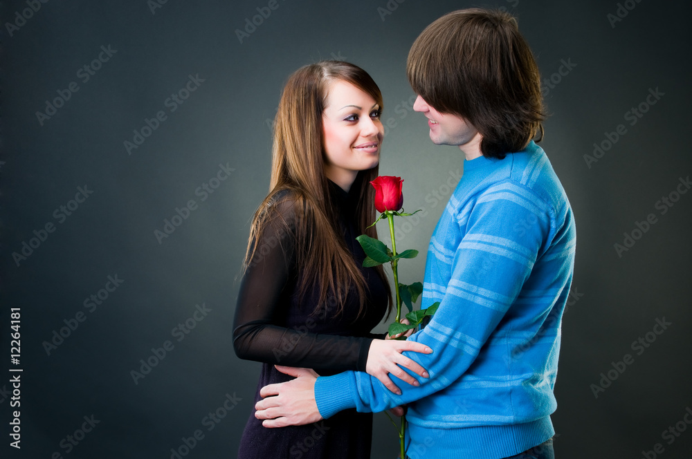 Happy couple with rose