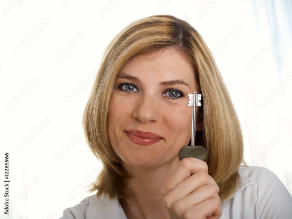 a of keys in a hand girl. a of keys in a hand girl.