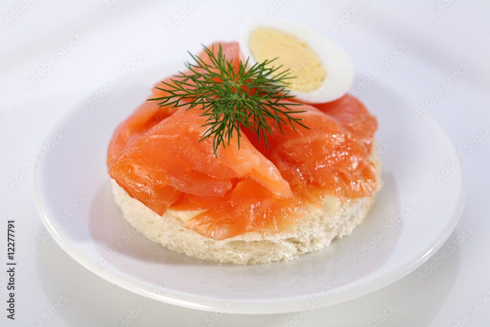 Smoke salmon on bagel with freshly black pepper. Smoke salmon on bagel with freshly black pepper.